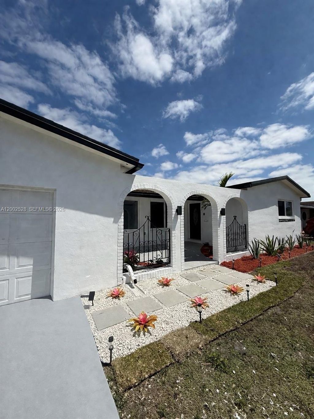 Photo of 7631 Harbour Blvd, Miramar, FL 33023 (MLS # A12002528)