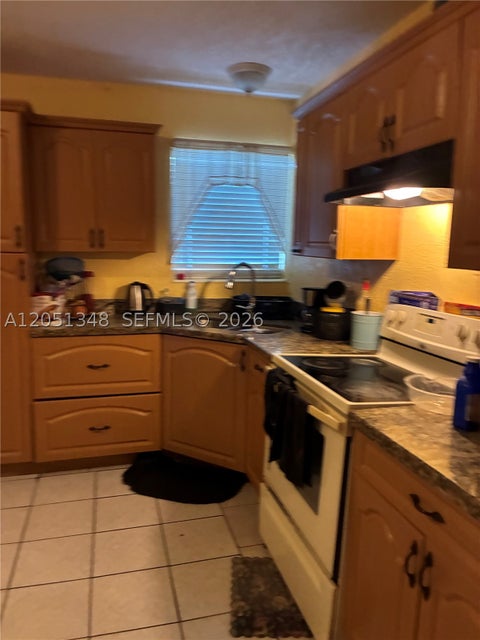 Photo of 1011 NW 183rd Dr, Miami Gardens, FL 33169 (MLS # A12051348)
