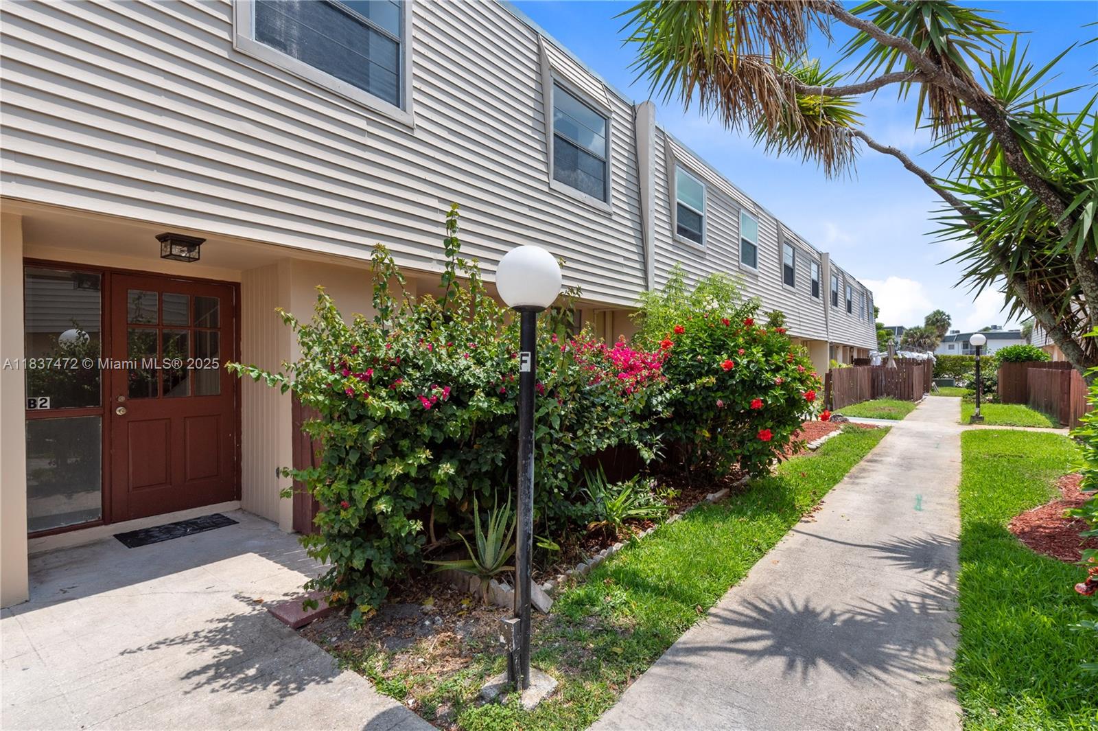 Spacious 2/1.5 Townhouse. Newer light fixtures and ceiling fan. Updated kitchen with quartz counter top and SS appliances. Stackable washer/dryer inside the unit. Large principal bedroom with walk in closet. private covered courtyard. Conveniently located near aquatic center and 441. Plenty of guest parking and community pool .