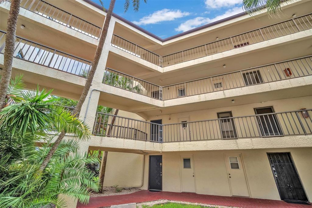 Photo of 2311 S Cypress Bend Dr #316B, Pompano Beach, FL 33069 (MLS # A11871085)