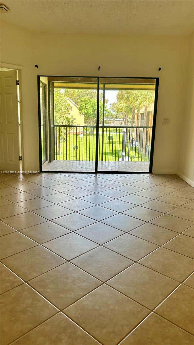 Photo of 2481 NW 56th Ave #6-16, Lauderhill, FL 33313 (MLS # A12029602)