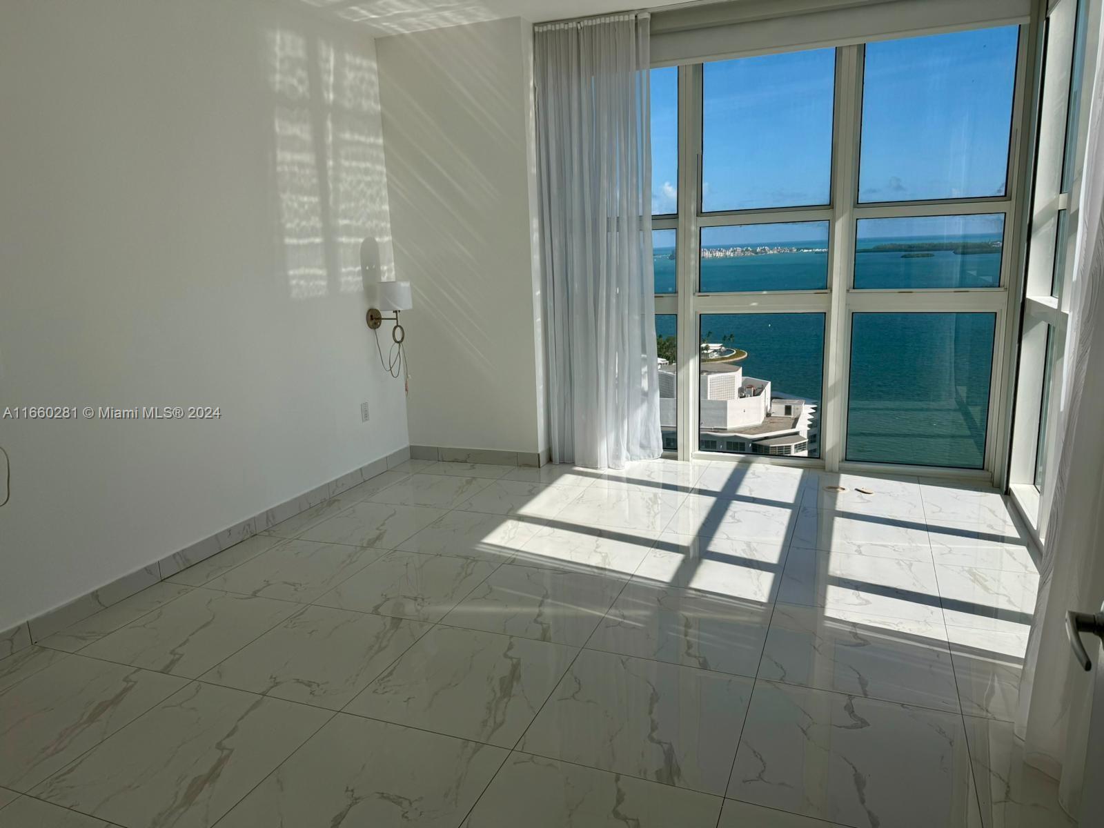 THE PLAZA 901 BRICKELL CO - Residential Lease