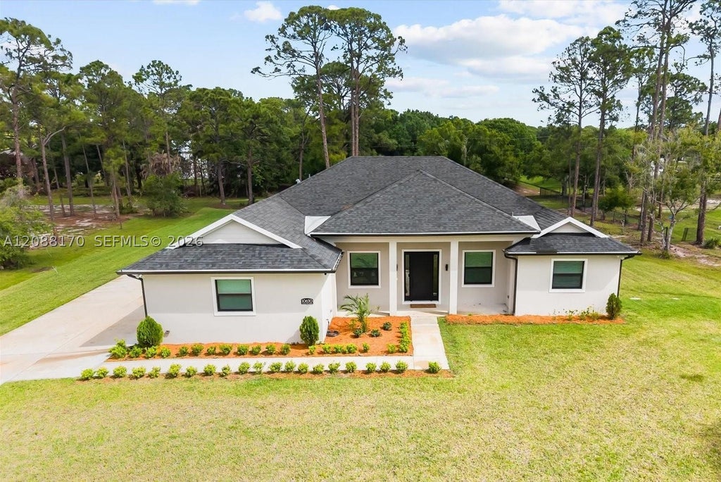 Photo of 10630 Sugar Pine Dr, Fort Pierce, FL 34945 (MLS # A12088170)