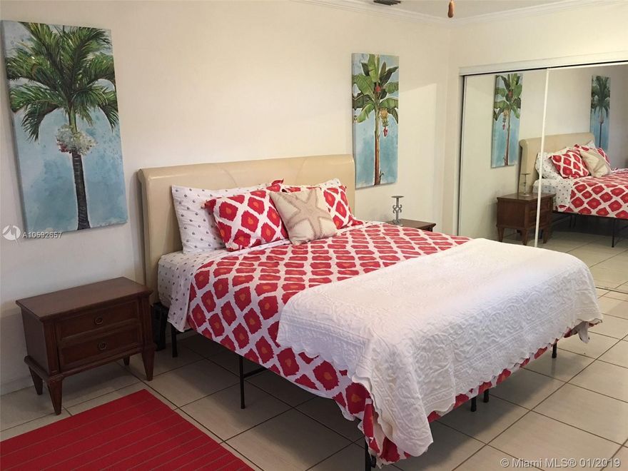 Great Investment Opportunity. Tenant in place for next year while you make your plans for this great corner lot. Or enjoy Island Living in this very charming Key Biscayne home. 3B/2B, paver brick entry and large living/dining/kitchen/office "open concept" living space. French doors off entry lead to the Master Bedroom, ensuite bathroom & additional exit slider to the back yard. Kitchen is very spacious w/ custom cabinetry, counter top seating for 6, built in office, sliding doors to patio and sliding pass-thru window for serving. Great patio area for entertaining with ample tree coverage. Double gate at side yard is perfect area for storing jet ski, golf cart etc. Proof of funds required.