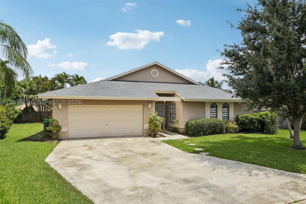 Photo of 10411 NW 31st Ct, Sunrise, FL 33351 (MLS # A12045046)