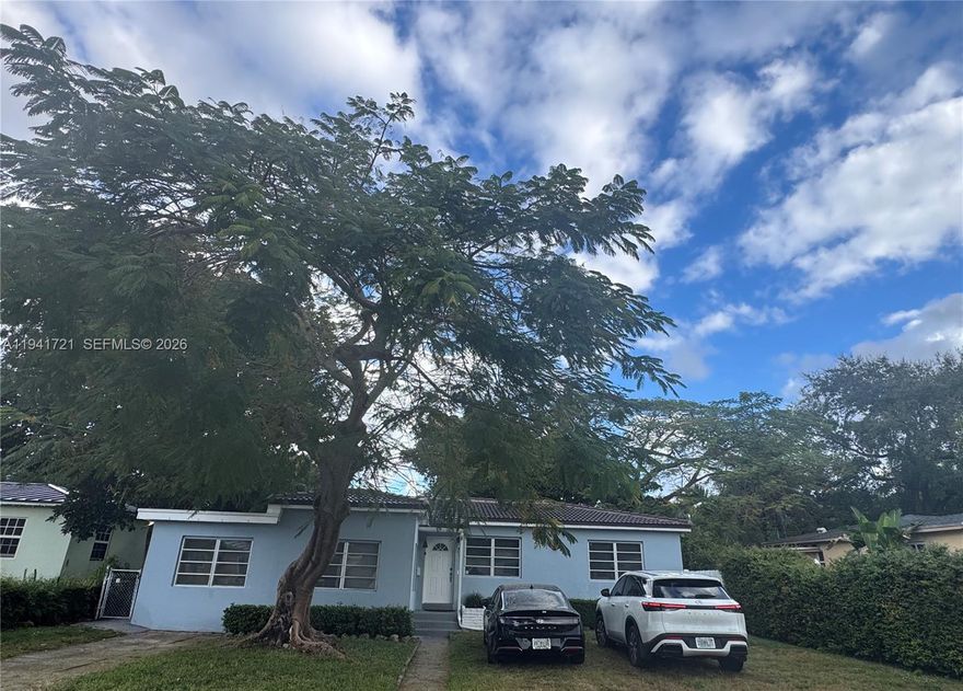 Beautifully updated home in a quaint, quiet neighborhood in unincorporated Miami-Dade, just steps from Miami Shores and Biscayne Park. Ideal for homeowners or investors with flexible use as a private residence, Airbnb, or both. Main home offers 2 beds/1 bath, modern kitchen, and shared living area. An additional 2 beds—with potential for a 3rd (currently a second kitchen)—can connect to the main home or function independently. Recent upgrades include new roof, A/C, plumbing, and electrical. Neighborhood has underground electric utilities. Other features: 2 stoves, 2 refrigerators, W/D, wine cooler and patio shed. Enjoy a serene fenced backyard with mature trees and spacious patio. Easy access to shopping, dining & highways. EZ to show!