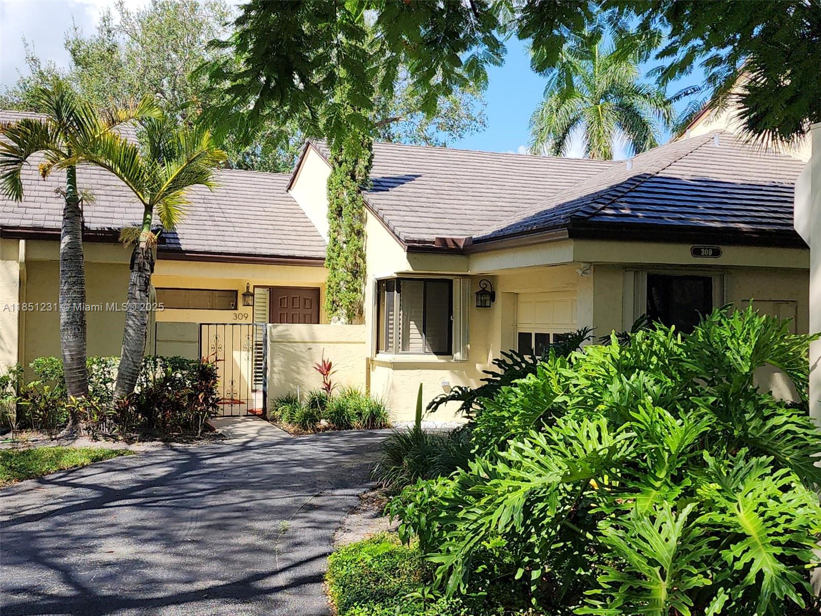 Rarely available lakefront 2 BR/2 BA VILLA w/1-car garage in Chelsea II! Enjoy the lush mature landscape, wide lake views & sunsets every day! Only 96 units in Chelsea II! Courtyard entry. Galley kitchen w/granite counters, wood cabinets in cream, SS appliances 2018 include: Frigidaire Fridge, oven, micro, dishwasher.Washer 2024. Water htr 2017. NO POLY PIPES! Replaced & permitted 12/2017. Wood flooring thru-out.Primary bath w/walk in shower/double sinks.Walk in closet. NO popcorn on ceilings. Hi-hats! Huge attic space w/pull down stairs. Accordion shutters. Plantation Shutters. Pet friendly. Close to Central Park, transportation, dining, shopping, Mo.fee of $515 includes roof/roof maint, exterior, common area, landscaping, sprinklers, community pool, hot tub, grills, kids area, clubhouse.