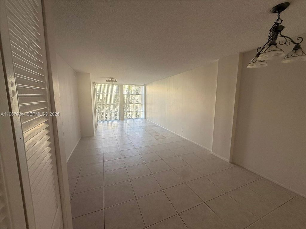 Photo of 801 Three Islands Blvd #403, Hallandale Beach, FL 33009 (MLS # A11967034)