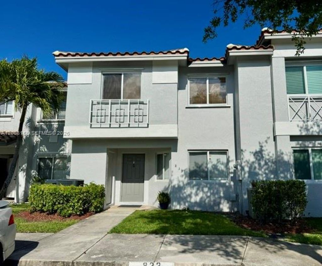 Photo of 833 NW 208th Ter #833, Pembroke Pines, FL 33029 (MLS # A12008155)