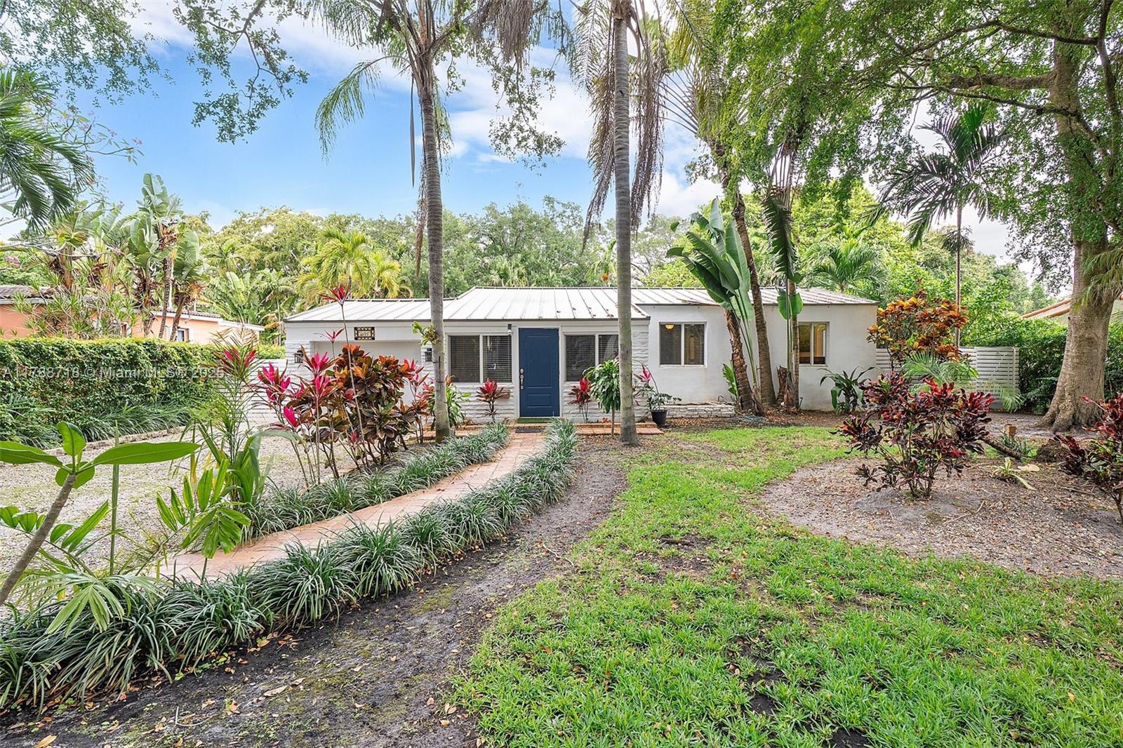 1055 Ne 120th St, Biscayne Park, Miami-Dade County, Florida - 4 Bedrooms  
2 Bathrooms - 