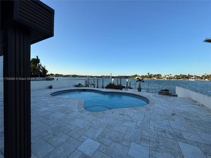 This residence offers unparalleled views of Biscayne Bay and the Billionaire’s Bunker on Indian Creek. Set on a prime waterfront lot, the home boasts a 50-foot dock with direct access to Biscayne Bay and the ocean, all under the protection of 24-hour security. Great neighbor to live or invest.
The property features a panoramic pool, a private dock, and is just moments from Miami Beach and the iconic Bal Harbour Shops one of the most coveted locations in Miami.