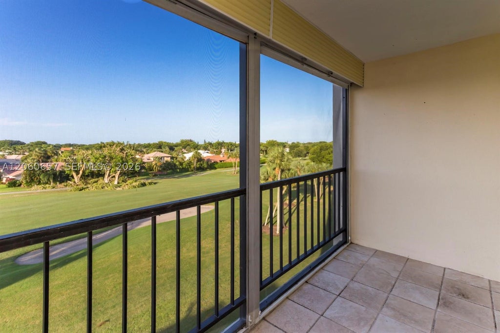 Photo of 2430 Deer Creek Country Club Blvd #510-2, Deerfield Beach, FL 33442 (MLS # A12060657)