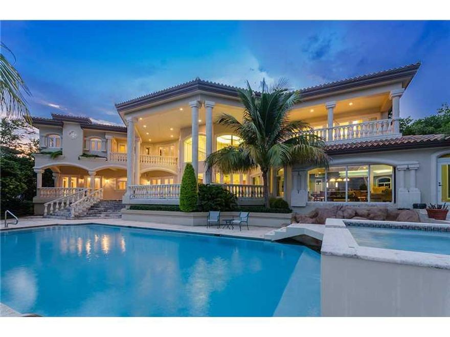 *Bayfront! Dockage! Private Tahiti Beach Estate! Spacious floorplan, high ceilings throughout, 2 bonus rooms. Fireplace, elevator, huge kitchen area, new impact windows, clubroom - perfect for entertaining - great views from everywhere, 49,000 S.F. lot, r esort style pool area, media room and lots more! Only 28 private residences in this 24 hour guarded / gated community! Easy to show!!