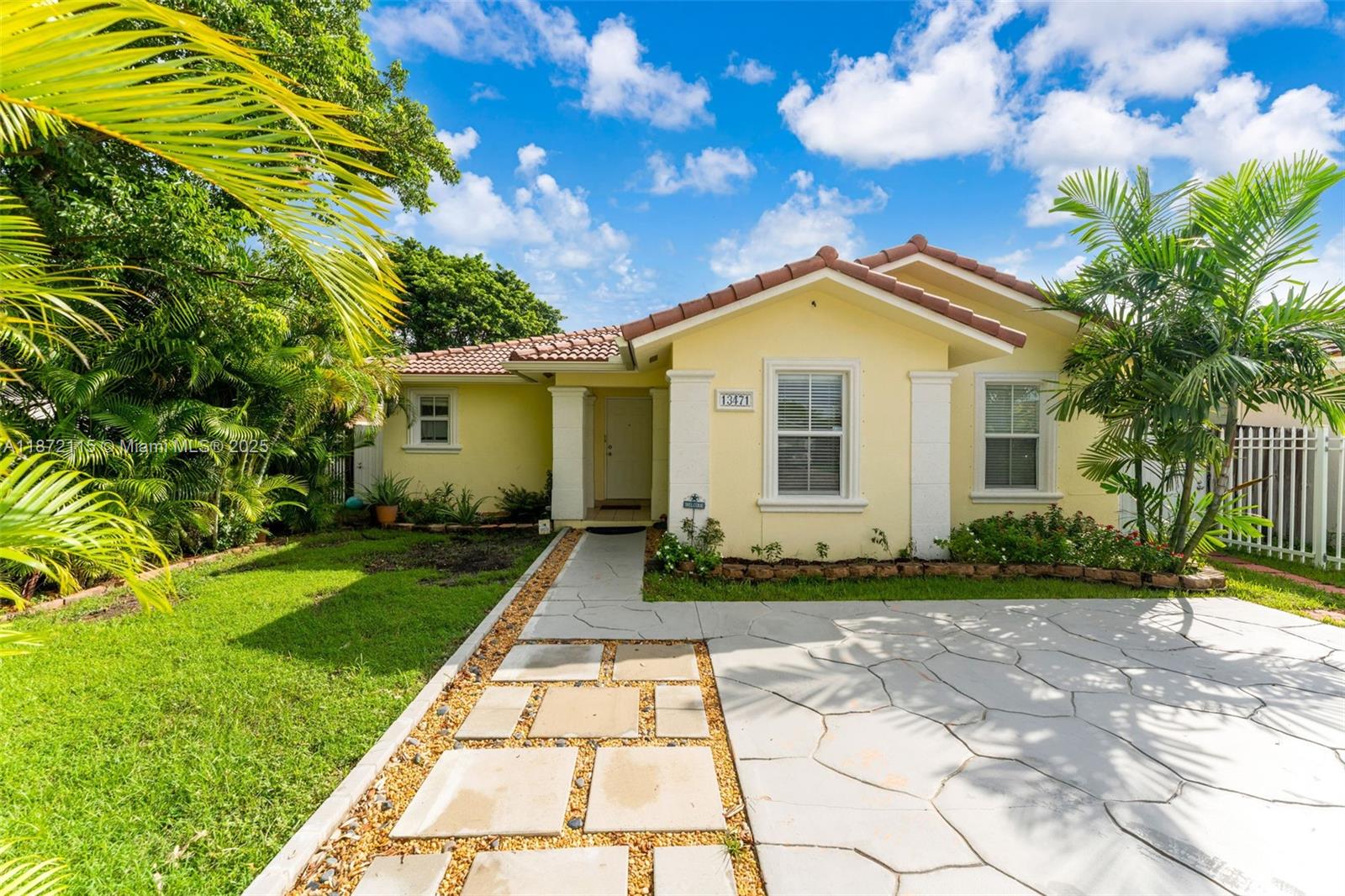 No HOA! Move-In Ready! This charming 3-bedroom, 2-bath gated home sits on a 5,000 sq. ft. lot with vacant land behind for added privacy. Step inside to discover a well-maintained home with bright and airy space, vaulted ceiling, split-floor plan, master suite & walk-in closet. Showcases stainless-steel appliances (Whirlpool fridge included, not pictured) and stays cool with 2019 A/C unit. Outdoors, enjoy a lush tropical escape with avocado, banana, lemon, papaya, and coconut trees. The covered terrace is perfect for entertaining or relaxing year-round in your own backyard paradise. Unbeatable Location! just off the Turnpike Exit 6 for easy commuting, 30 minutes to the Florida Keys, and minutes from shopping, hospital, Black Point Marina, and more. NO ASSOCIATION! Don't wait. Call today!