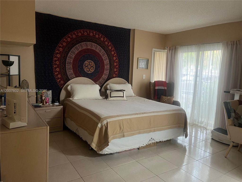 Photo of 4720 SW 62nd Way #101, Davie, FL 33314 (MLS # A12007602)