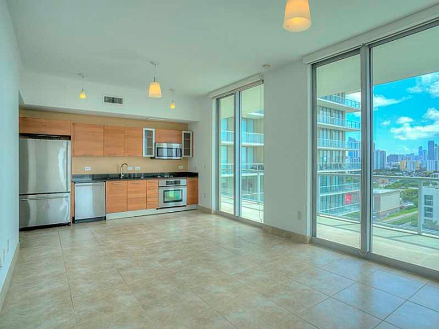 Corner 2 BD / 2 BA apartment in Midtown 2, Split floor plan, s/s appliances, granite counter, high ceilings, floor-to-ceiling glass, over 500 SQ FT of balcony space with panoramic city view. Walk to many local shops, restaurants, cafe's, the Miami Design  District and Wynwood Art District. Midtown 2 offers state of the art amenities, 24HR security, concierge, fitness center, plunge pools, tower service at the pool, outdoor kids playground, and many outdoor sitting areas.