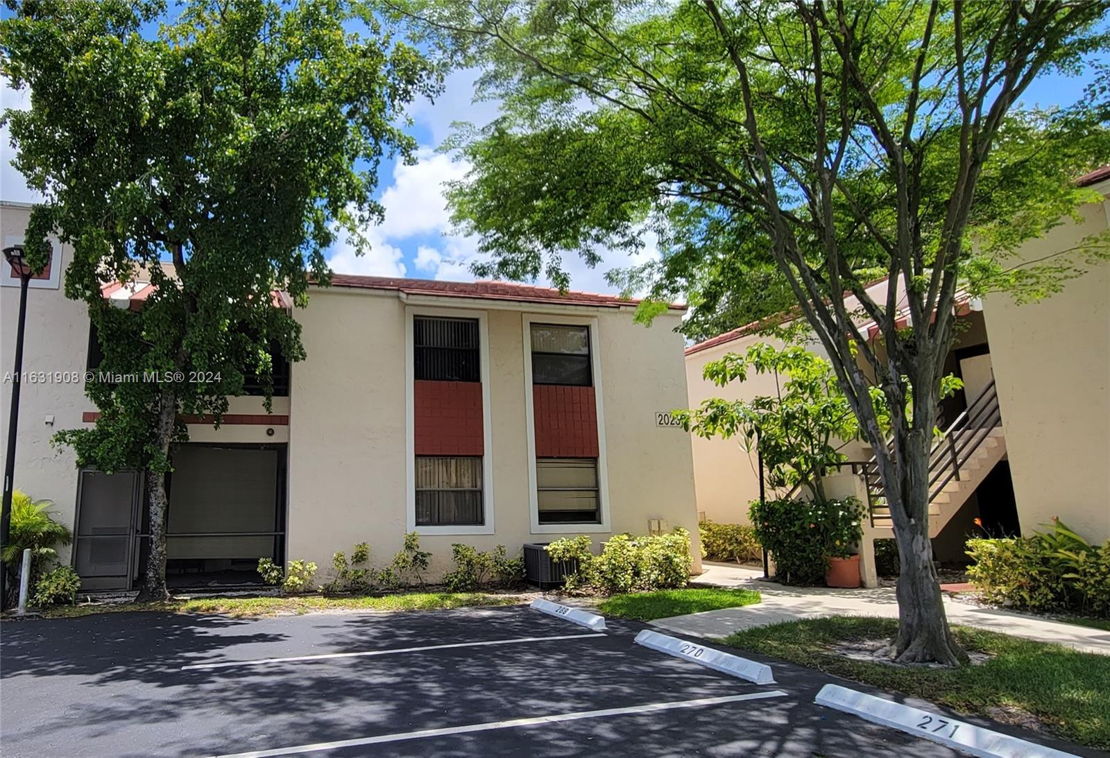 QUATRAINE CONDO III - Residential Lease