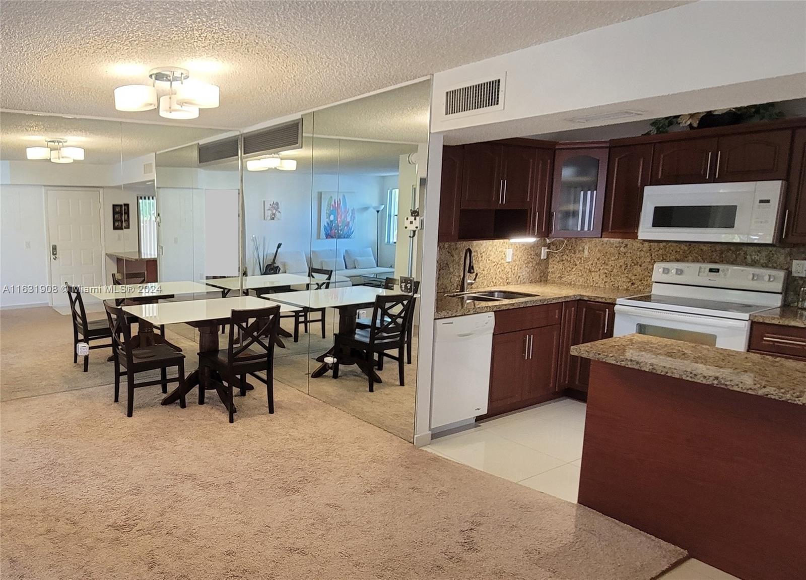 QUATRAINE CONDO III - Residential Lease