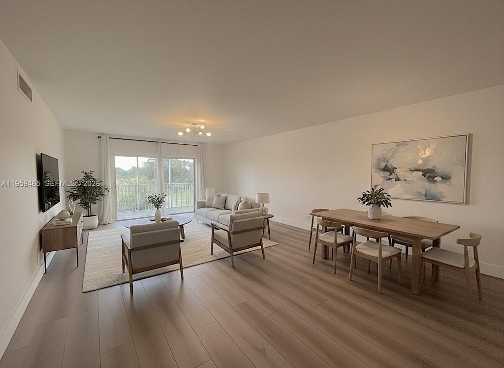 Photo of 5100 SW 90th Ave #302, Cooper City, FL 33328 (MLS # A11959465)