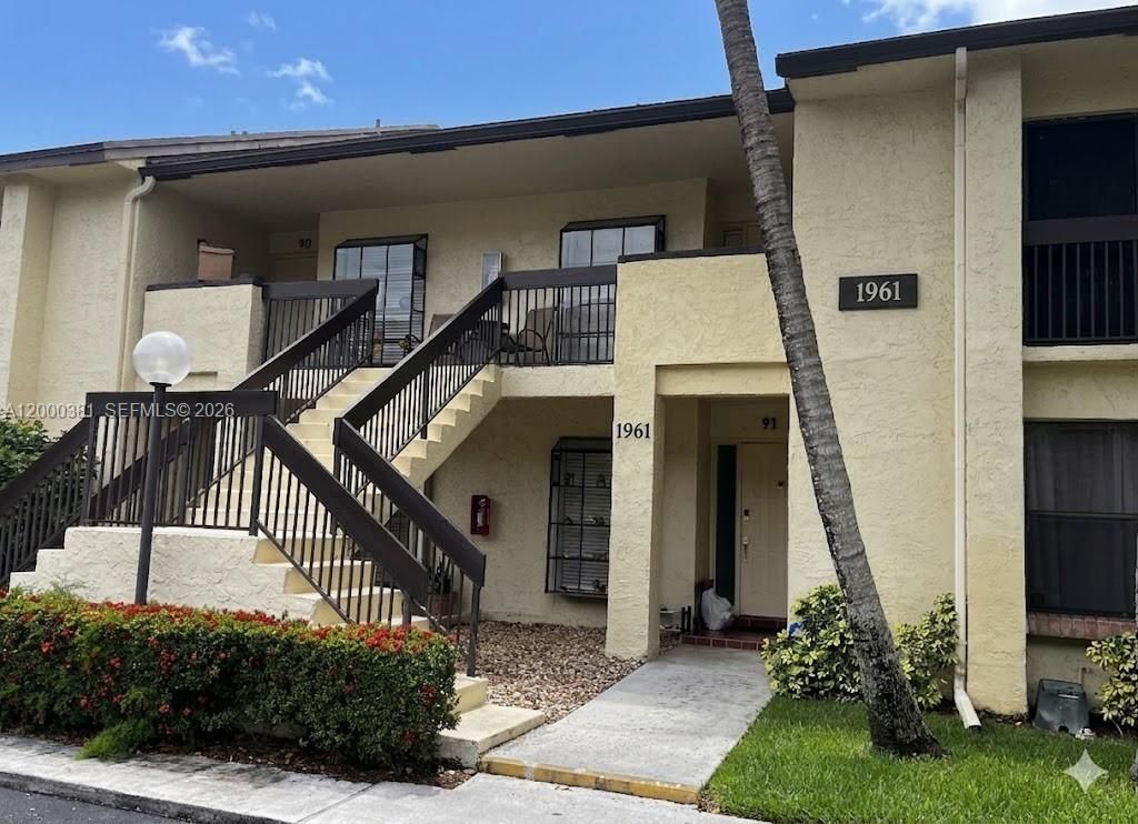 Photo of 1961 SW 15th St #90, Deerfield Beach, FL 33442 (MLS # A12000381)