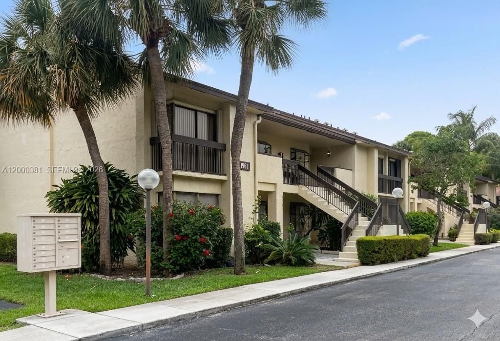 Photo of 1961 SW 15th St #90, Deerfield Beach, FL 33442 (MLS # A12000381)