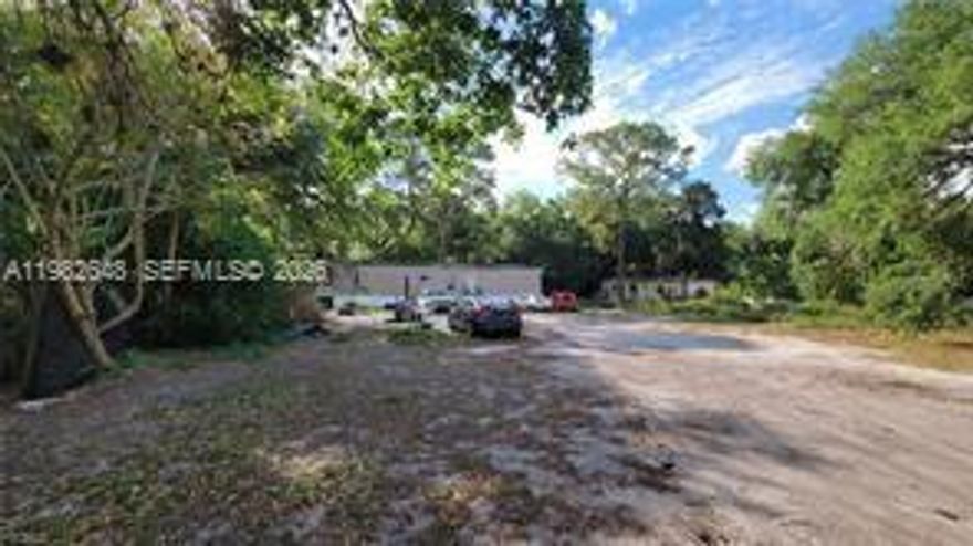 Affordable investment opportunity or a beautiful 1.45+/-acre homesite for your new dream home! This 3-bedroom 2 bath home is currently rented on a month-to-month basis. (Cash offers only)