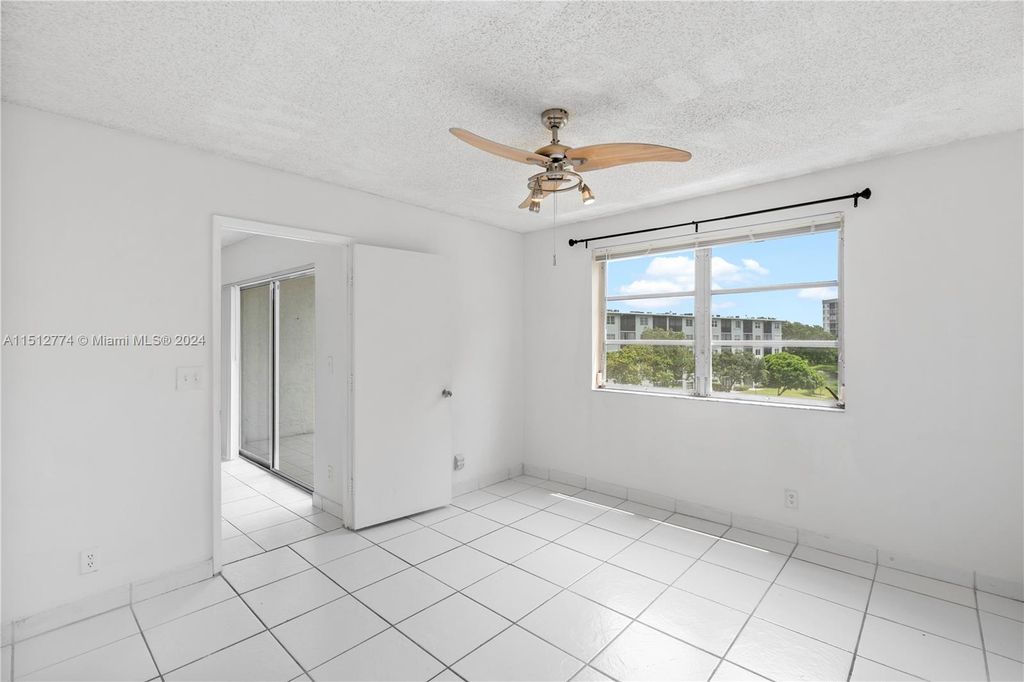 Photo of 2228 N Cypress Bend Dr #LPH406, Pompano Beach, FL 33069 (MLS # A11512774)