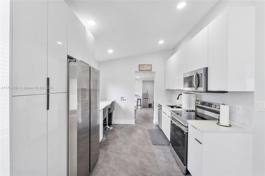 Completely renovated income producing property! Was purchased as a duplex (A11252450) but is a single family home. Currently being rented as a 3/2. In a safe prime location on a low-traffic hidden street. Unit A is a 2/1 bath with vaulted ceilings, Unit B is a 1 / 1. Both sections have extremely high end finishes. Samsung appliances, high end impact windows and doors, tankless water heater, new plumbing, electric, insulation, and energy saving mini splits to keep all the bills affordable. Green and energy efficient home. There are two washer and dryers connections on the property. A corner lot with a large backyard! You are walking distance to the beach, Starbucks, fine dining, and Publix! There is no better property for the price, being sold fully furnished. You will LOVE this property.