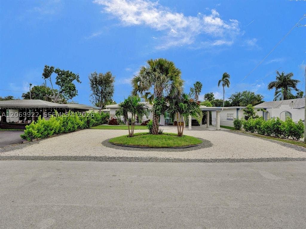 Photo of 1580 NE 34th St, Oakland Park, FL 33334 (MLS # A12069922)