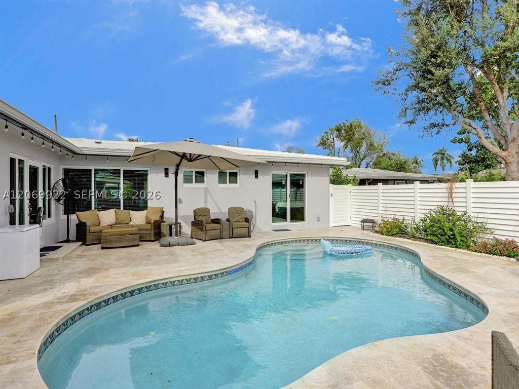 Photo of 1580 NE 34th St, Oakland Park, FL 33334 (MLS # A12069922)