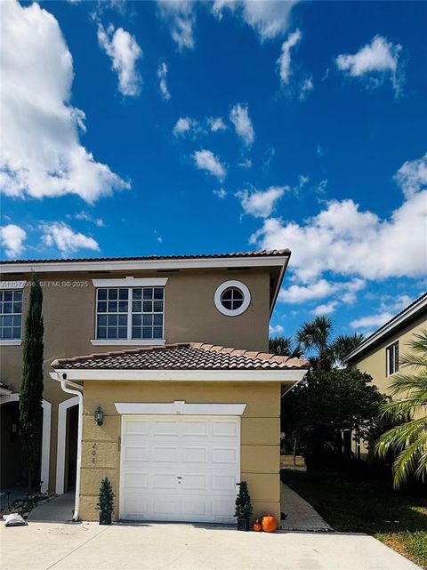 Photo of 208 SW 120th Ave, Pembroke Pines, FL 33025 (MLS # A11917366)