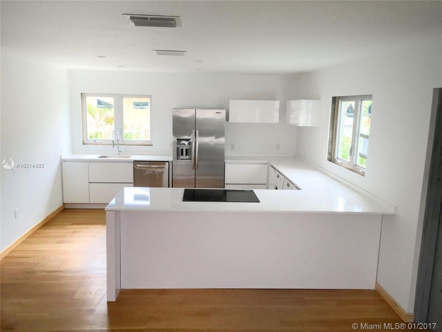 Beautiful 2/1, totally renovated, all new. Wood floors, stainless steel appliances in the up and coming Buena Vista neighborhood. Only 10 blocks to the design district with gated parking. Beautifully landscaped yard with lots of fruit trees.