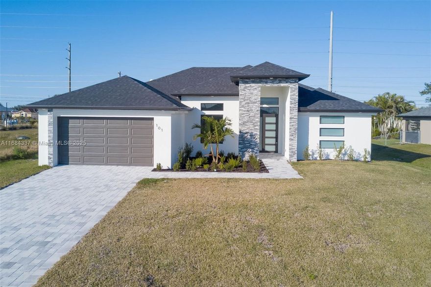 Welcome to the stunning Azul model in Cape Coral! This brand-new construction home offers an expansive 1,894 sq ft of living space, featuring 4 spacious bedrooms and 2 bathrooms. Step inside to discover the elegance of tile flooring that flows seamlessly throughout the home, providing both durability and a touch of modern sophistication. The kitchen features boasting waterfall quartz countertops, a hood, and high-end stainless steel appliances, including a refrigerator, stove, and dishwasher. Situated in a desirable Cape Coral neighborhood, this new construction home is close to shopping, dining, and entertainment.  Don’t miss the opportunity to own this exquisite, newly built property—schedule your private showing today!