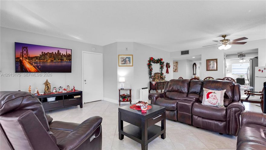 Welcome to resort-style living in Century Village Pembroke Pines. This first-floor corner unit, ideally located next to the back entrance, offers easy access and added privacy and is one of the larger models at 1,540 sq ft. The home features two walk-in closets, new flooring (2016), a renovated master bathroom (2022), new A/C (2022), new water heater (2024), new hurricane shutters, and new blinds throughout, along with a tiled balcony and a kitchen equipped with stainless steel appliances. The HOA provides exceptional value, covering water, exterior insurance, roof, cable TV, WiFi, and landscaping, while offering resort-level amenities including multiple pools and an Olympic-size pool, golf course, tennis courts, racquetball, water sports, transportation services, and two clubhouses with a theater and a full calendar of social events and activities, recreation areas, and fully equipped gyms.