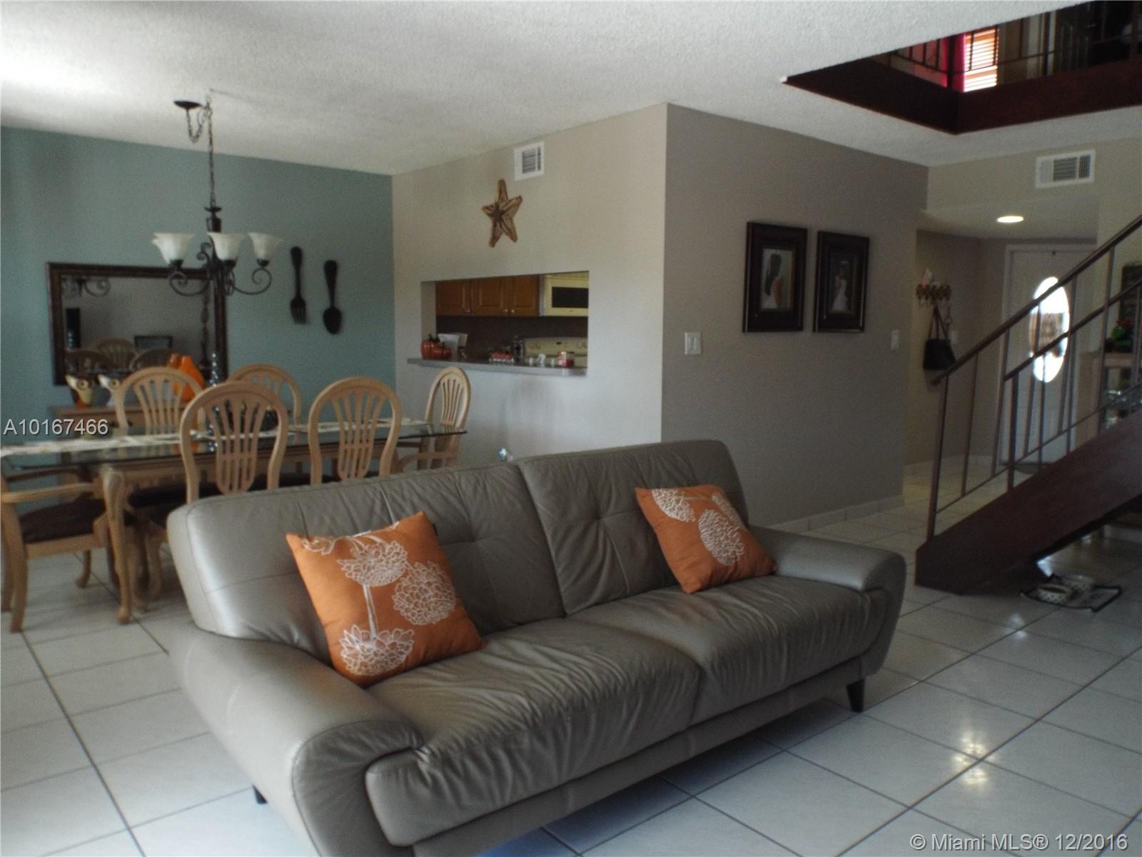 A Truly Gem ! Thownhouse 3/2.5 PLUS DEN that can be used as a fourth bedroom,living and dining room on first floor with a half bath bedroom,covered patio, tile flooring,immaculate condition, move-in ready,HE washer & dryer inside unit, big size master,low maintenance, close to everything once you enter you will want to make it yours!.