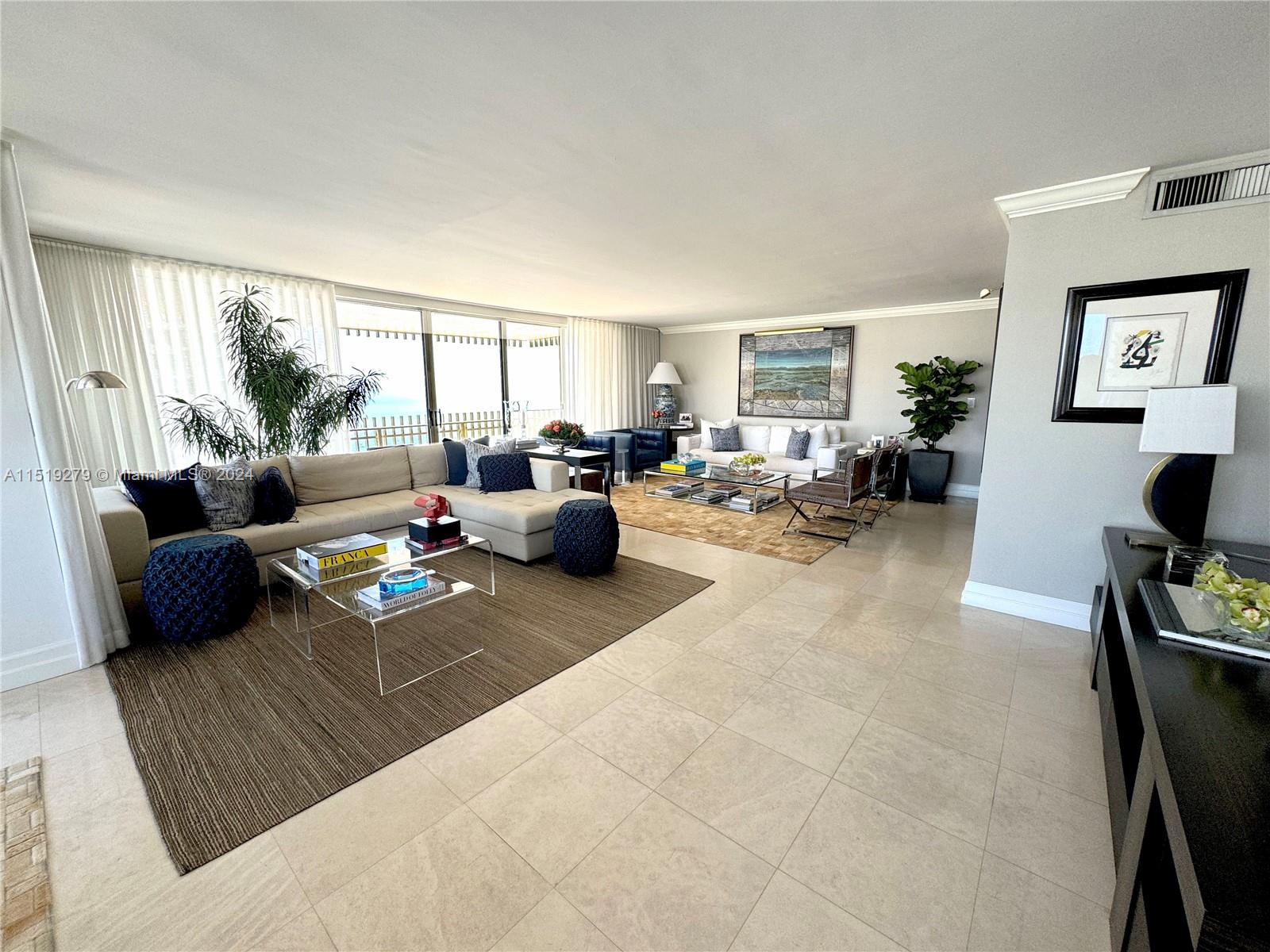 Rare and desired 09 line featuring a spacious and updated 3 bed 2.5 bathroom with gorgeous water views. Large oversized living, family room, formal dining, with a separate breakfast area. Primary suite includes private balcony, spacious walk in closet and a generous bathroom.
Grove Isle features resort like amenities, private gym, tennis courts, pool areas, library, and party space perfect for entertaining and marina.