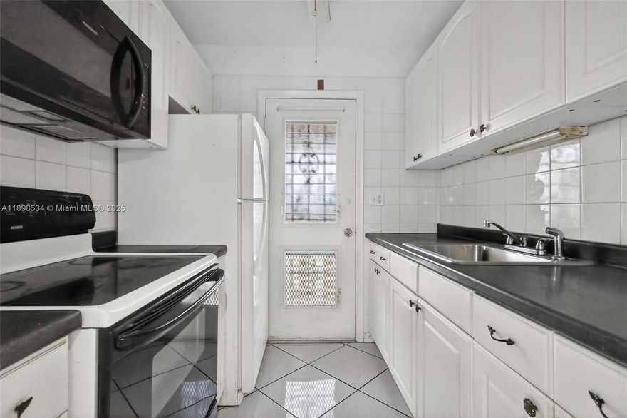 Welcome to the Mar-Len Gardens, bldg 11. This 1 bedroom & 1 bathroom is on the top floor, light & bright & waiting for the next homeowner to make it their own. Updated kitchen with white cabinets & tile floor throughout. One of the rare unit with Central air! Screened balcony with quiet views on the gardens. Hopa Verified Community with lots of activities and fun. COOP with land lease. Cash only, No Rental 1st year, then once a year for a max of 4 months, Gated community with 2 pools, clubhouse, gym & inside pickleball.. Only 3 miles to the beach Beach! Closed to the restaurants & stores! Call fast, won't last! Monthly fees are $675 including maintenance, land lease (until 2064) & taxes that you will not have to pay at the end of the year. Such a great opportunity to own a place in Miami