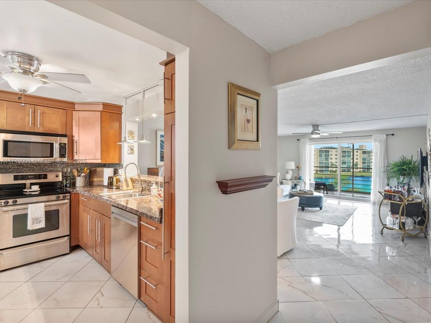 Beautiful 2BD/2BA Condo with Stunning Lake Views in a 55+ Community

This charming 2-bedroom, 2-bathroom condo offers breathtaking lake views and a bright, comfortable living space. The open kitchen features stone countertops, stainless steel appliances.

The unit boasts tile flooring throughout for easy maintenance, impact windows for added peace of mind, and overlooks the tranquil lake offering a relaxing retreat.

The building is impeccably maintained, providing residents with access to a clubhouse, exercise room, and heated pool.

Situated just 6 minutes from Dania Beach and close to restaurants, Publix, and entertainment, this condo is part of a vibrant 55+ active community. Don’t miss your chance to own a peaceful slice of paradise—schedule your showing today!