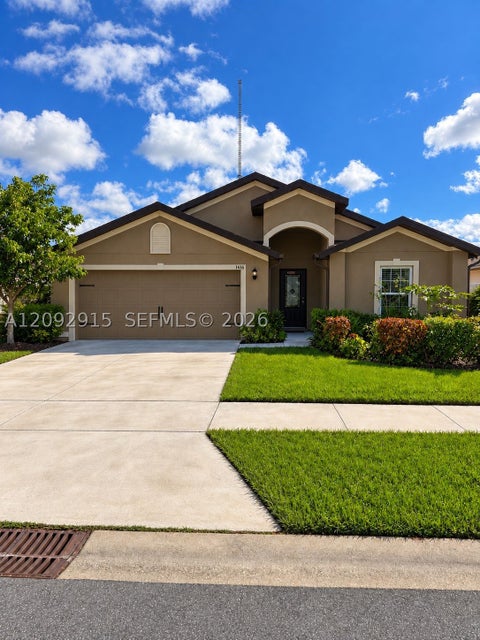Photo of 1416 Celebration Dr, Fort Pierce, FL 34947 (MLS # A12092915)