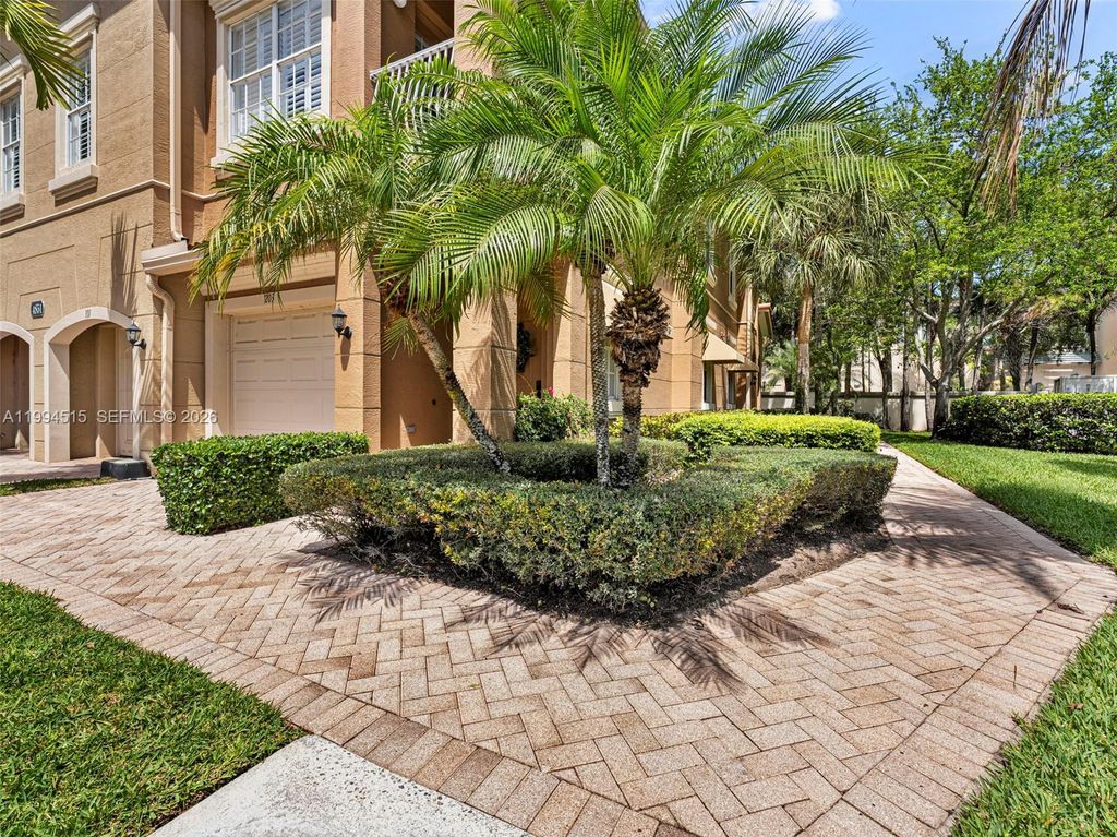 Photo of 4851 Bonsai Cir #101, Palm Beach Gardens, FL 33418 (MLS # A11994515)