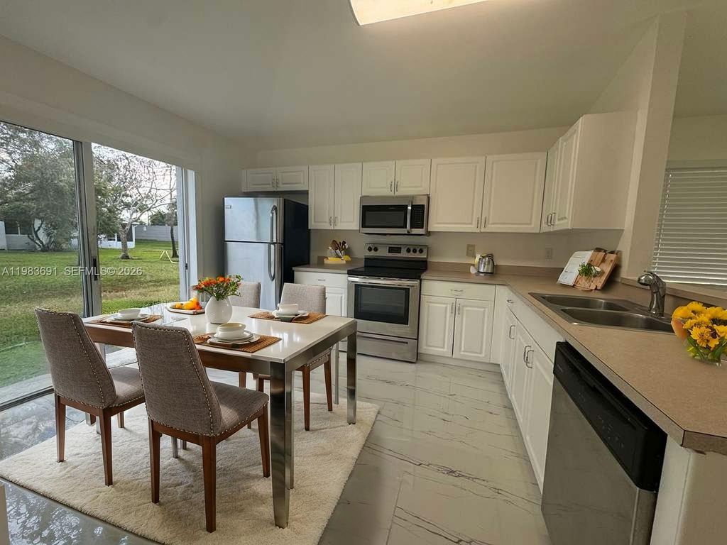 Photo of 20874 NW 2nd St, Pembroke Pines, FL 33029 (MLS # A11983691)