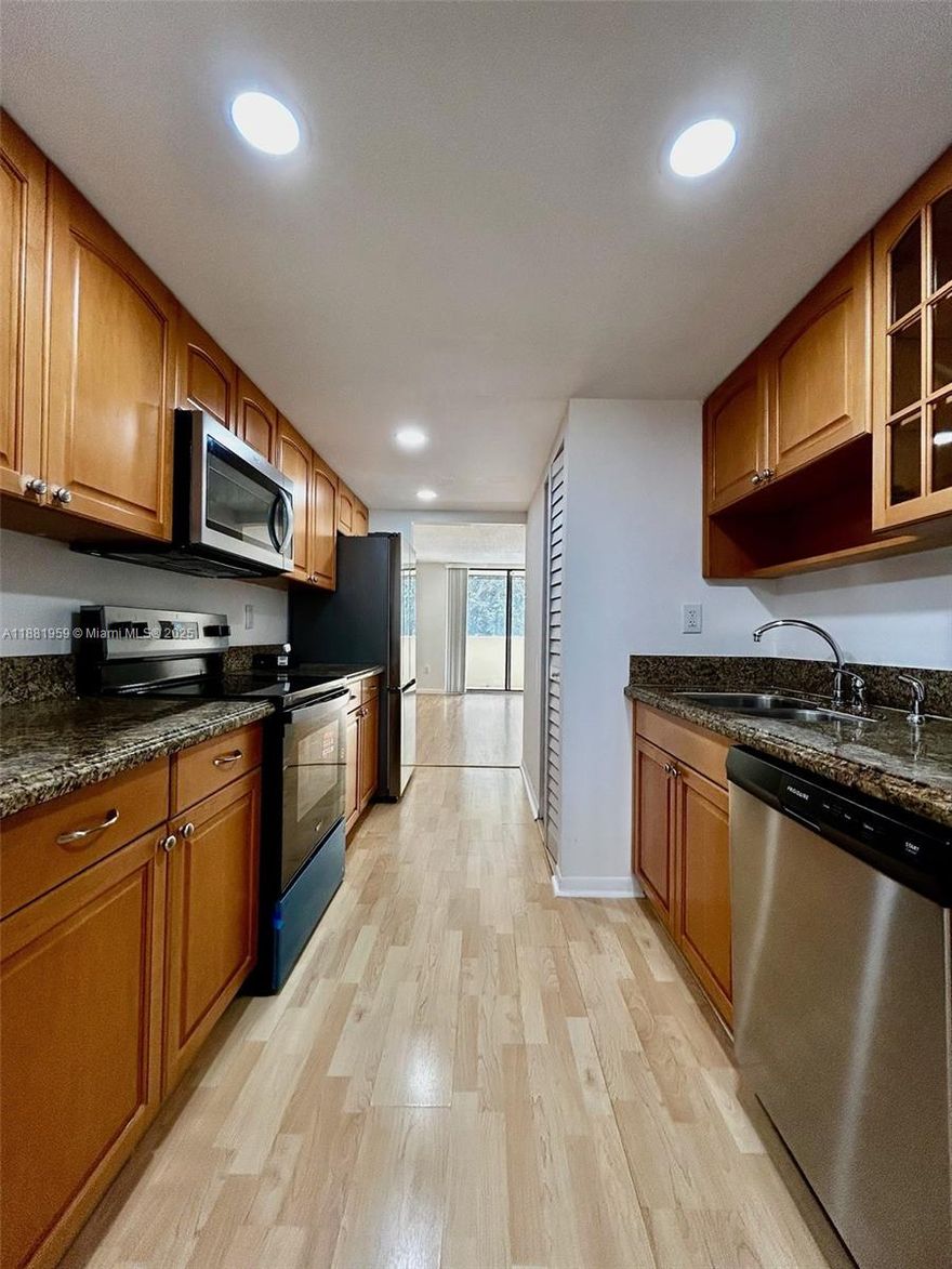 Welcome to this spacious, updated 2BR/2BA condo in the heart of Plantation, just renovated & freshly painted. Kitchen  with granite counters, bright breakfast nook and brand new appliances including washer & dryer, range and dishwasher, plus a 2-yr refrigerator and 3-yr A/C & water heater.  Garden view balcony and large walk-in closets add to the charm. Community offers gated entry, pool, playground, 2 assigned spaces and ample guest parking. Strong building 15% reserves allow a conventional loan with as low as 3% down. All ages welcome! Excellent location with easy access to highways, near malls, dining, 15 min to Sawgrass Mall and just 20 min to Fort Lauderdale beach.  Come enjoy the best of the Florida Lifestyle.