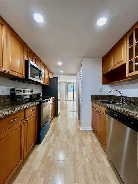 Photo of 7451 NW 16th St #304, Plantation, FL 33313 (MLS # A11881959)