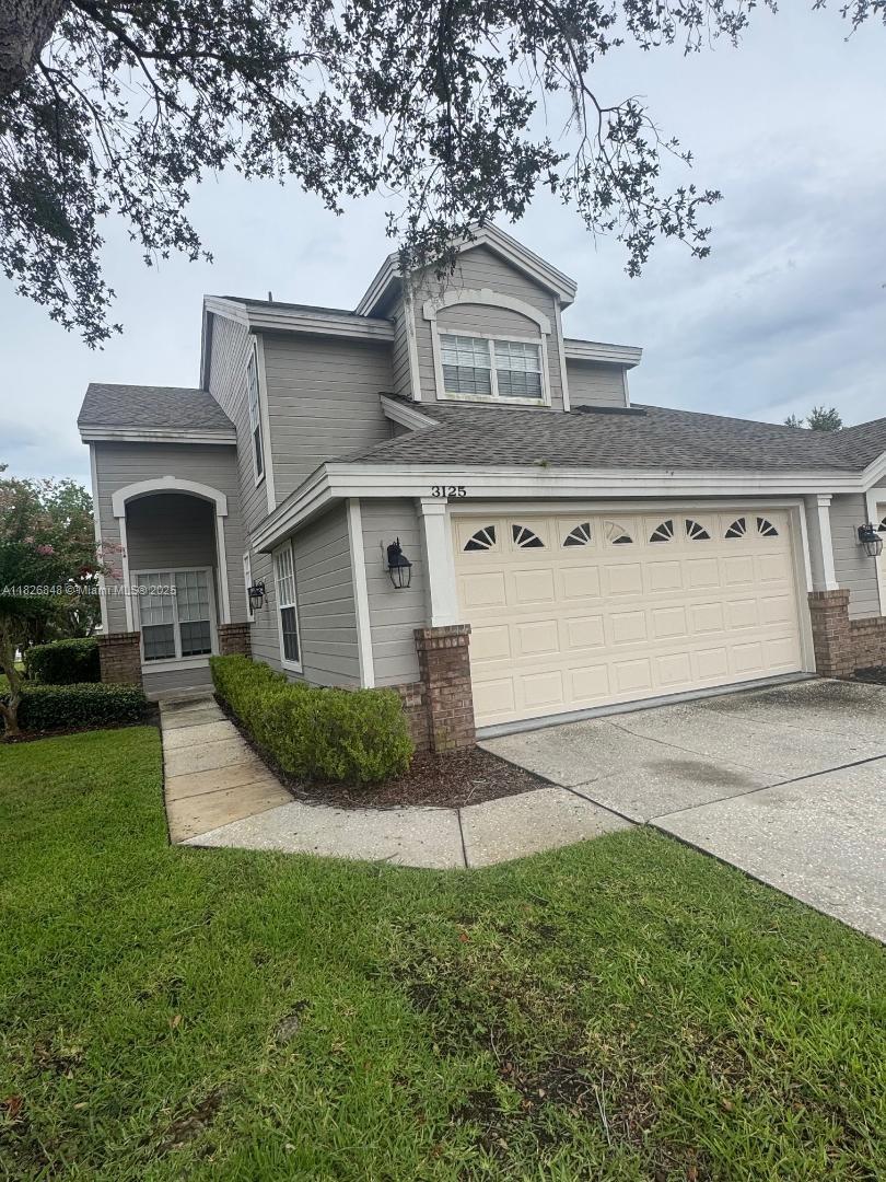 This waterfront townhouse is in the Stonewater gated community In the city of Lakeland, Florida 33803, and has a 3-bedroom/2.5 bath, 2-car garage with an EV electric charger. It has been remodeled with new paint, tile, and wood floors, as well as granite countertops, a laundry room, a screened porch, and community amenities that include a heated pool, tennis court, party room, and more. The condo offers maintenance-free living and is conveniently located close to shopping.