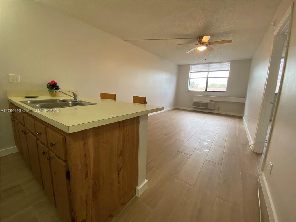 Photo of 2501 Riverside Dr #314-A, Coral Springs, FL 33065 (MLS # A11794193)