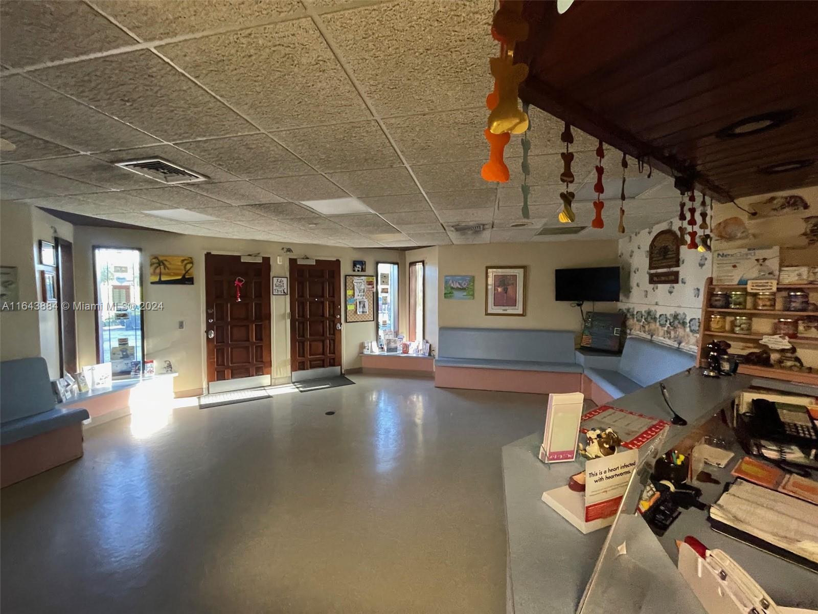 Old Cutler Animal Clinic is nestled in the heart Cutler Bay, this is a rare opportunity to own a well-established veterinary practice with deep roots. This property spans three spacious lots, totaling 19,000 sq. ft., offering a versatile blend of developed and undeveloped land. The clinic itself occupies a 3,199 sq. ft. building that has been a cornerstone of animal care since 1974.
The property includes two 6,500 sq. ft. lots housing the main clinic and parking, while the third 6,000 sq. ft. lot remains undeveloped, providing a serene grass area where animals can walk and play. This unique feature enhances the clinic’s offerings, giving pets a place to enjoy the outdoors during their visit.
Old Cutler Animal Clinic presents a prime investment in a beloved community. Business included!!