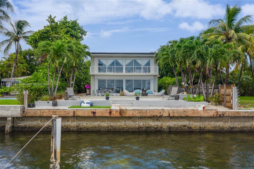 Presenting a rare opportunity to own waterfront in this highly desirable area, enjoy the beautiful sweeping view with MIAMI'S BEST PRICED BAY FRONT HOME! Nestled in a quiet street, this home has 5 bedrooms and 4 full baths with a private master suite on the second floor. Spacious home with a 2 car garage, large laundry room, security system, and a brand new roof that was just completed. This property has limitless untapped potential and a huge chance for a savvy purchaser to capitalize on this rare offering.