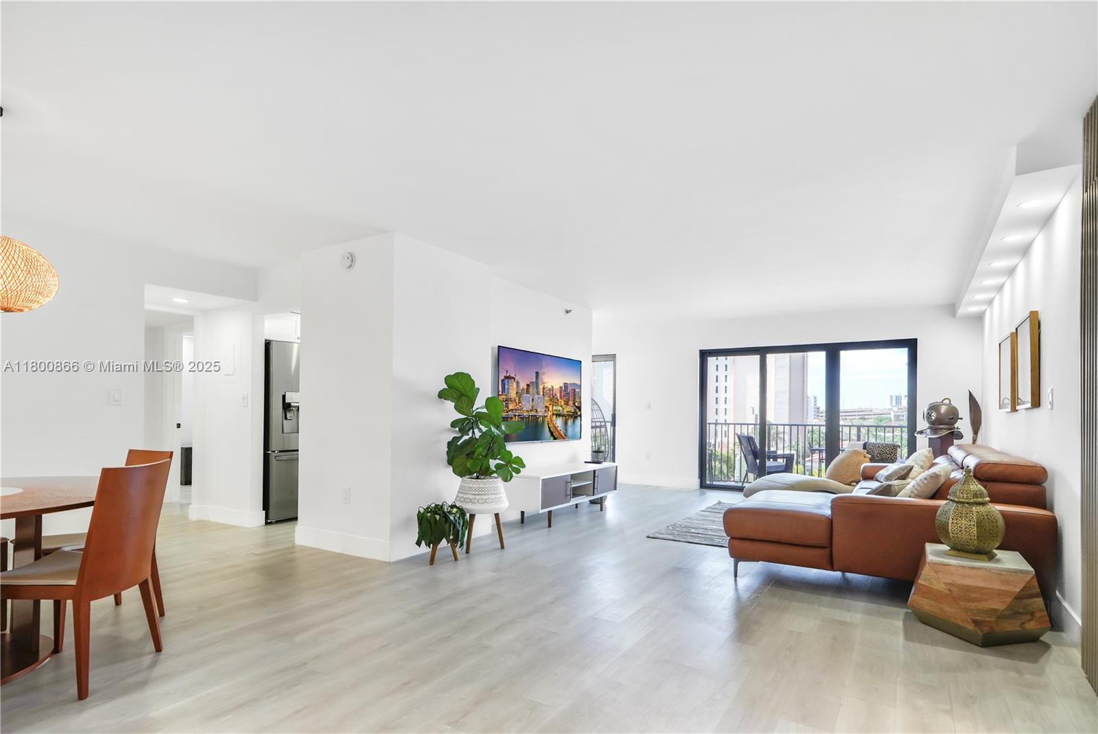 Beautifully renovated 2-bed, 2-bath condo in the sought-after Summit Towers on Hollywood Beach, offering 1,570 sq.ft. of stylish coastal living. This spacious unit features smooth ceilings, impact windows, modern doors, blackout shades, and recessed LED lighting. The kitchen is sleek and functional with quartz countertops, stainless steel appliances, and modern cabinetry. Both bathrooms are fully updated with glass walk-in showers and custom vanities. Organized walk-in closets, in-unit washer/dryer, and a private balcony to take in the ocean breeze. Just steps from the beach and Hollywood Broadwalk, with resort-style amenities including 2 pools, tennis, pickleball, gym, restaurant, 24/7 security, and garage parking. Best-priced remodeled unit in the building—move-in ready and a must-see!