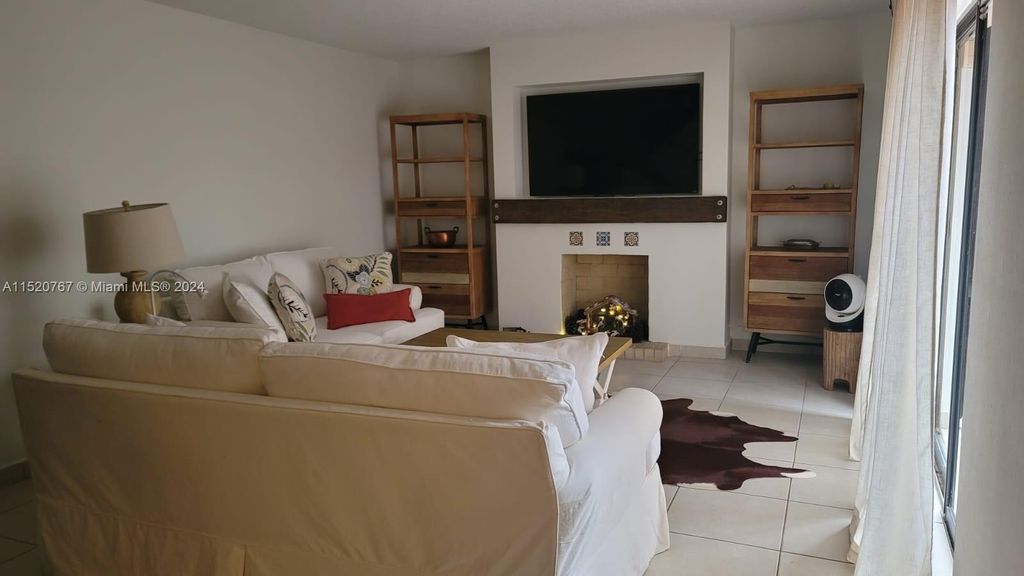 Photo of 1544 Forest Lakes Cir #D, West Palm Beach, FL 33406 (MLS # A11520767)