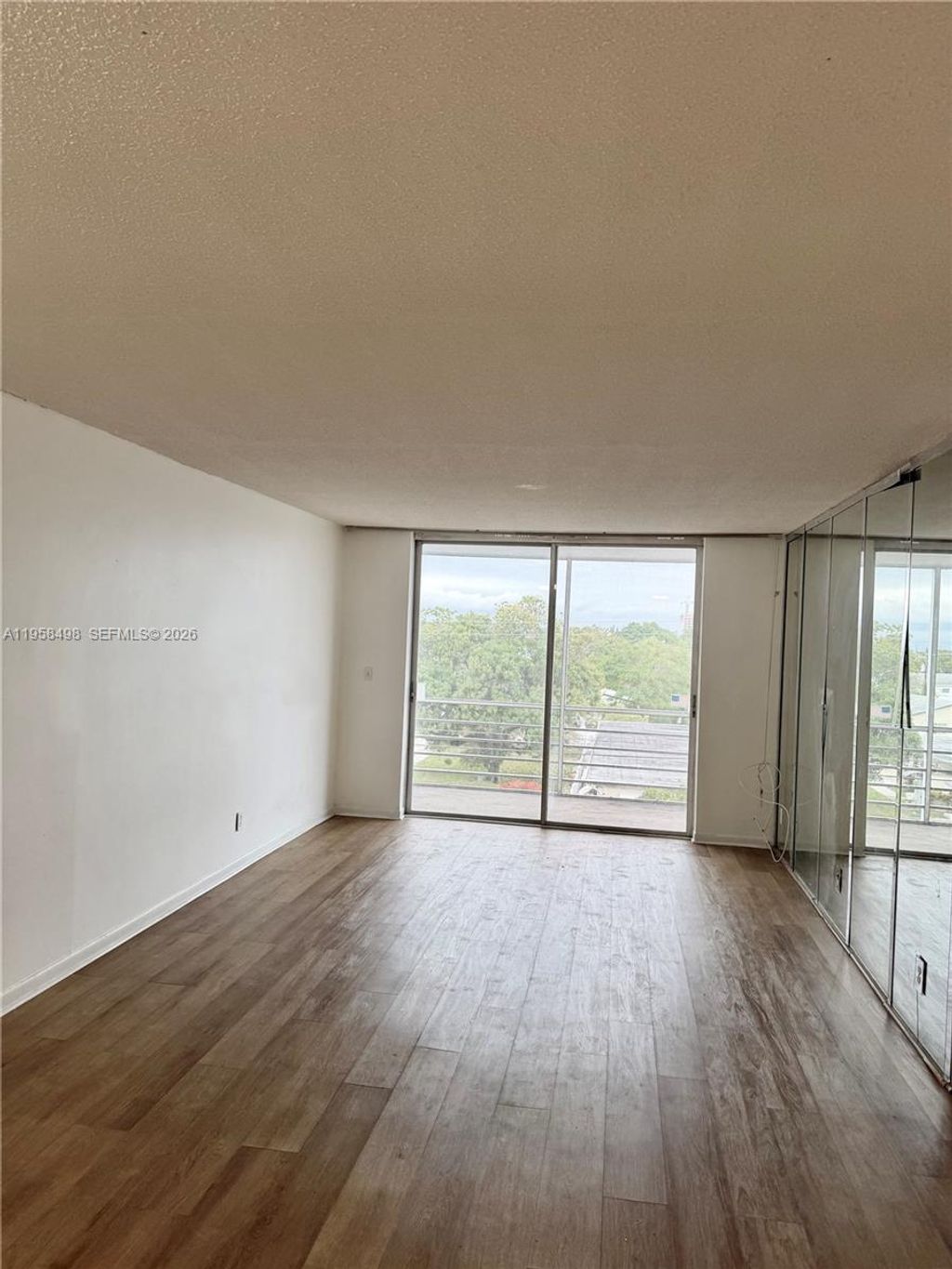 Photo of 1830 Dixieanna St #404, Hollywood, FL 33020 (MLS # A11958498)